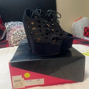 Used comfortable open toed platform wedges